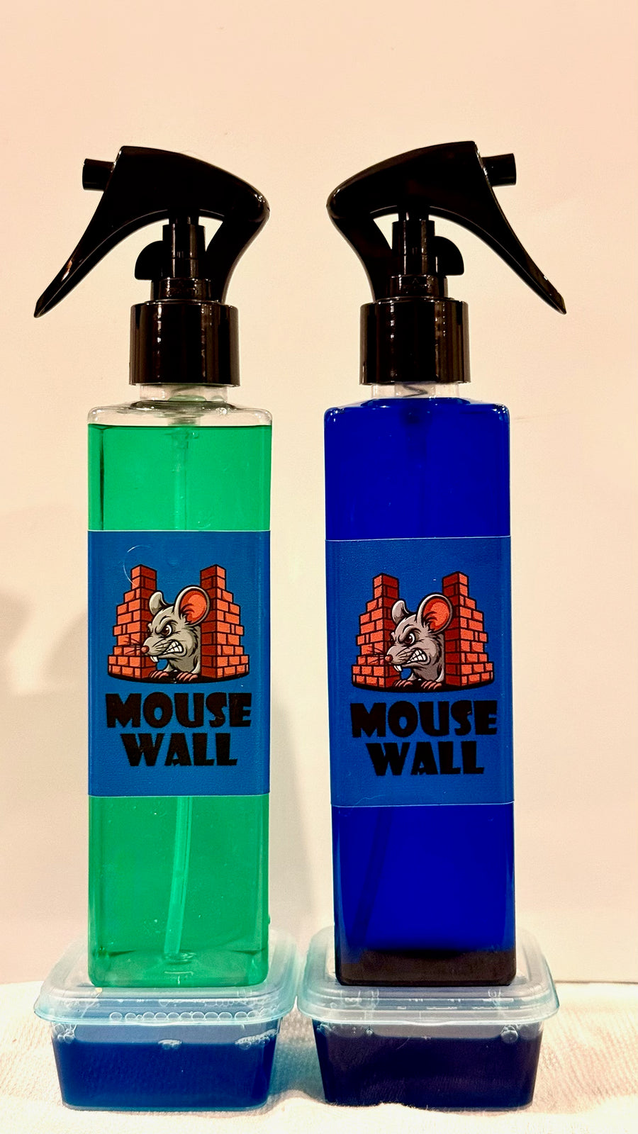 Motorhome and camper sized Mouse Wall spray bottles with tubs of Mouse Wall Paste